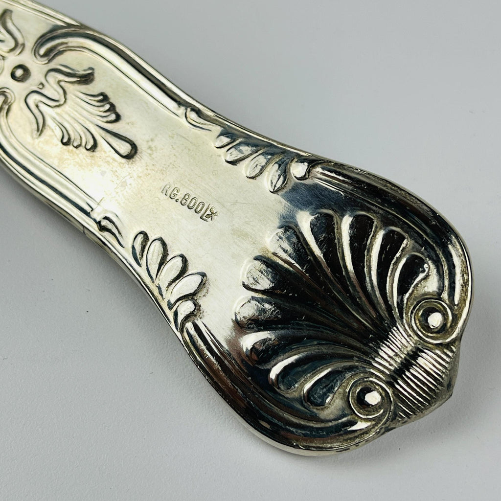 Vintage Italian decorative 800 silver spoon handle with intricate patterns on a light gray background 1960s, hallmark of arg 800