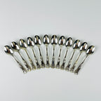 Vintage Italian set of 800 silver spoons on a light gray background, 1960s