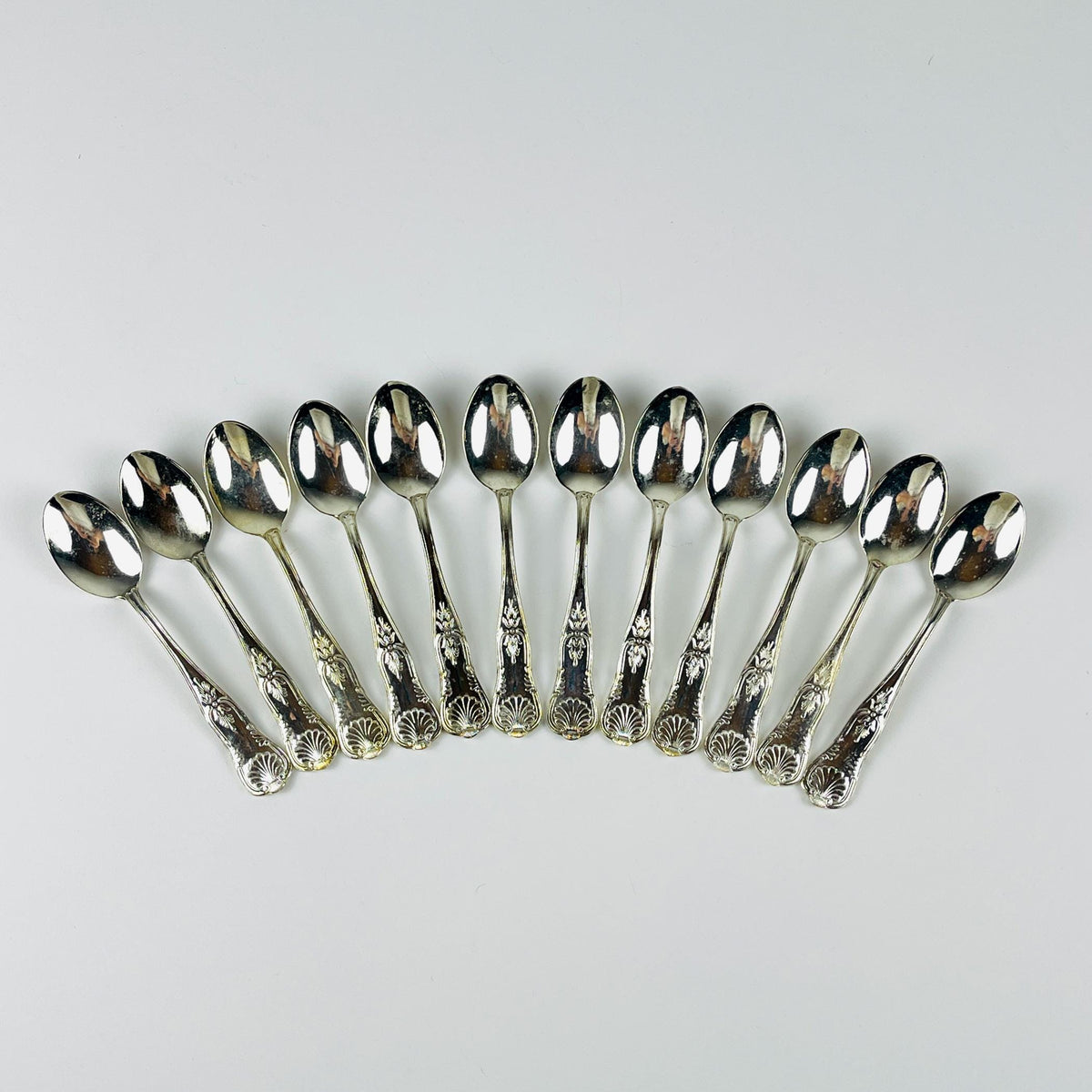 Vintage Italian set of 800 silver spoons on a light gray background, 1960s